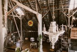 The barn, replete with dance floor, chandelier, and neon signs. Photo courtesy of Westlund Photography